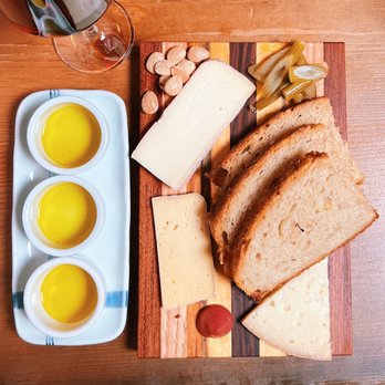 Tartuca - Cheese plate & olive oil flight - Italian Near Me - Portland, Oregon Tartuca - Cheese plate & olive oil flight - Italian Near Me - Portland, Oregon
