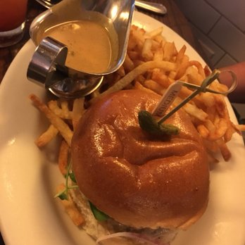 The Smith - Short rib blend burger with raclette cheese, red onion and green peppercorn sauce - New American Near Me - New York, New York The Smith - Short rib blend burger with raclette cheese, red onion and green peppercorn sauce - New American Near Me - New York, New York