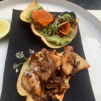 Comedor - Half eaten avacado and smoked tuna tostada - Mexican Near Me - Austin, Texas