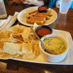 Artichoke dip and mozzarella sticks Artichoke dip and mozzarella sticks
