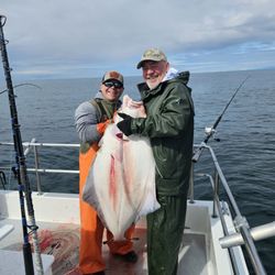 Pro Fish-N-Sea Charters - Deckhand Dylan from Minnesota, and my 1st over 27" Halibut.