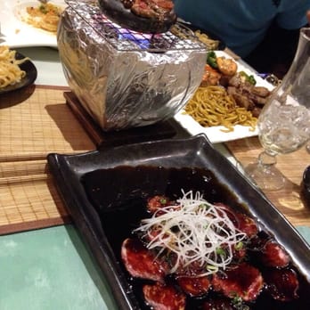 Yang's Asian Bistro - Interesting beef dish. Cook it in a small stone fire. The concept of Korean bar b q. - Japanese Near Me - Latham, New York Yang's Asian Bistro - Interesting beef dish. Cook it in a small stone fire. The concept of Korean bar b q. - Japanese Near Me - Latham, New York