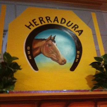 Herradura - a painting of a horse's head - Mexican Near Me - Bloomington, Illinois