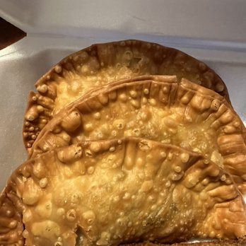Que Rico! Restaurant - two empanadas in a styrofoam container - Puerto Rican Near Me - Chicago, Illinois