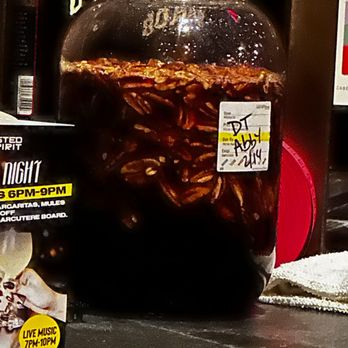 Roasted Spirit - This is the drink it's called The Downtown Abbey mixture of some flavored vodkas and whiskeys and Bourbons - Bars Near Me - Clermont, Florida
