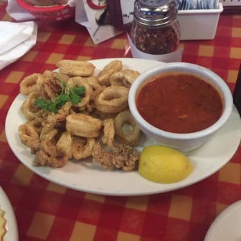 Rocco's Italian Restaurant - Fried calamari with marinara sauce - Italian Near Me - McLean, Virginia Rocco's Italian Restaurant - Fried calamari with marinara sauce - Italian Near Me - McLean, Virginia