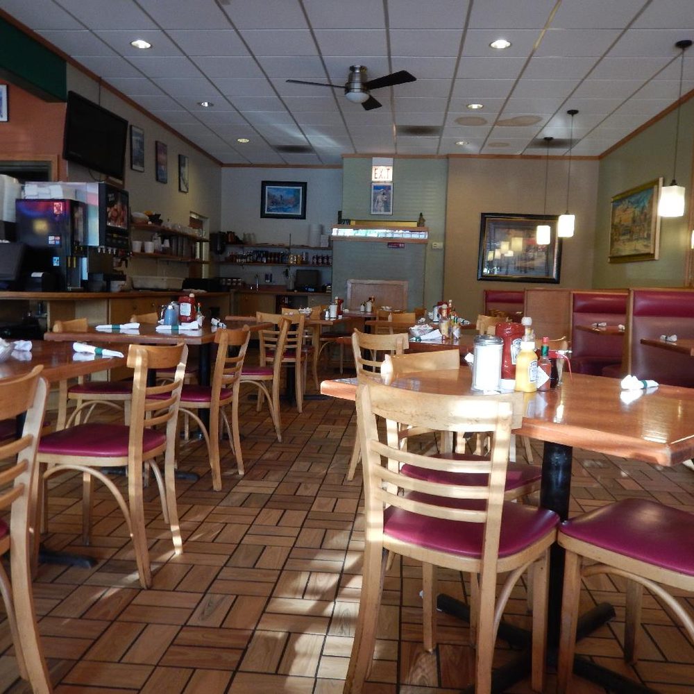 Lucky Grill - tables and chairs in a restaurant - Diners Near Me - Chicago, Illinois Lucky Grill - tables and chairs in a restaurant - Diners Near Me - Chicago, Illinois