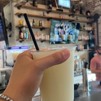 Banks Food Hall - Bar area inside: Pina Colada wine slushie - Food Court Near Me - Columbus, Georgia Banks Food Hall - Bar area inside: Pina Colada wine slushie - Food Court Near Me - Columbus, Georgia