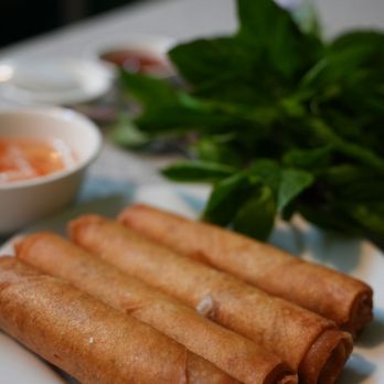 Pho Kapahulu - a plate of spring rolls and a bowl of dipping sauce - Vietnamese Near Me - Honolulu, Hawaii Pho Kapahulu - a plate of spring rolls and a bowl of dipping sauce - Vietnamese Near Me - Honolulu, Hawaii