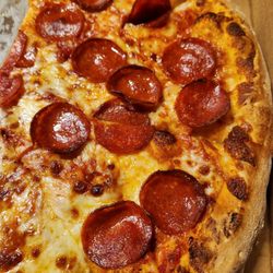 Brooklyn Pizza & Italian Grill - Pepperoni was delicious and perfectly greasy, thin and flexible.