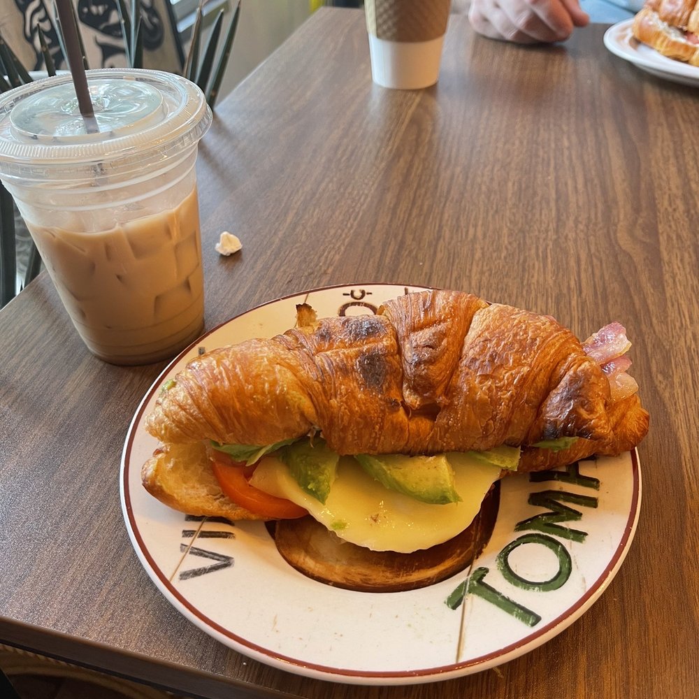 Ugly Mug Cafe & Coffee Roasters - Interbay - Croissant Breakfast Sandwich with avocado and bacon. - Coffee & Tea Near Me - Seattle, Washington Ugly Mug Cafe & Coffee Roasters - Interbay - Croissant Breakfast Sandwich with avocado and bacon. - Coffee & Tea Near Me - Seattle, Washington