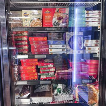 Amar Grocery - a refrigerator full of frozen food - Grocery Near Me - Fairfield, California