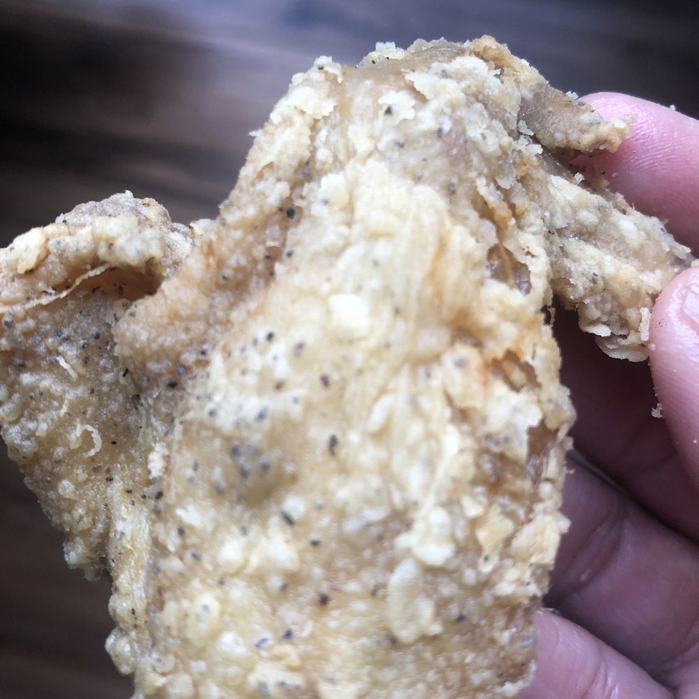 Harolds Chicken - a hand holding a fried chicken - Seafood Near Me - St. Louis, Missouri Harolds Chicken - a hand holding a fried chicken - Seafood Near Me - St. Louis, Missouri