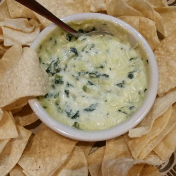 Logan's Roadhouse - Spinach artichoke dip appetizer w/ tortilla chips - Steakhouses Near Me - Owasso, Oklahoma