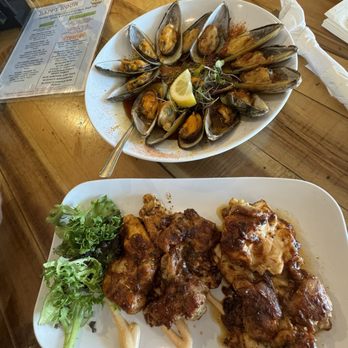 Zogg's Raw Bar & Grill - HH mussels and jerk chicken - Bars Near Me - Rehoboth Beach, Delaware Zogg's Raw Bar & Grill - HH mussels and jerk chicken - Bars Near Me - Rehoboth Beach, Delaware