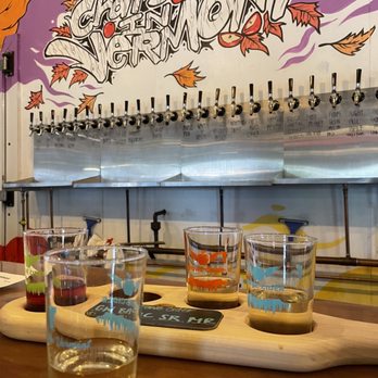 Stowe Cider - a row of glasses on a table - Cideries Near Me - Stowe, Vermont Stowe Cider - a row of glasses on a table - Cideries Near Me - Stowe, Vermont