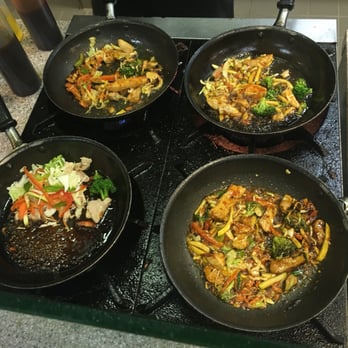 Plano Senior High School - Chef taking on the stir fry station, he's knocking out four orders at a time. We were up here teaching a class, we tried out their food. - Middle Schools & High Schools Near Me - Plano, Texas Plano Senior High School - Chef taking on the stir fry station, he's knocking out four orders at a time. We were up here teaching a class, we tried out their food. - Middle Schools & High Schools Near Me - Plano, Texas