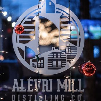Alévri Mill Distilling - a view of a building through a window - Distilleries Near Me - Clinton, Michigan Alévri Mill Distilling - a view of a building through a window - Distilleries Near Me - Clinton, Michigan