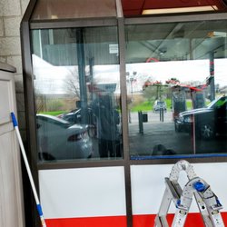 Williams Window Cleaning Services - Dirty Window on the left, Window cleaned by Williams Window Cleaning Services on the Right.