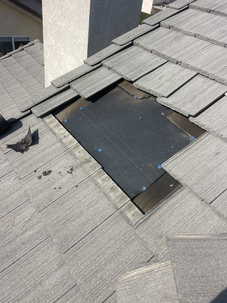 Slide of A Town Roofing