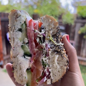 Hank's Bagels - #3- Hanks Gravlax, scallion cream cheese, salted cucumber, sprouts, capers, tomato, pickled onions, radish, and dill on an everything bagel - Coffee & Tea Near Me - Burbank, California Hank's Bagels - #3- Hanks Gravlax, scallion cream cheese, salted cucumber, sprouts, capers, tomato, pickled onions, radish, and dill on an everything bagel - Coffee & Tea Near Me - Burbank, California
