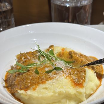 The Mexican - MANCHEGO WHIPPED POTATOES WITH CHORIZO GRAVY - Mexican Near Me - Dallas, Texas