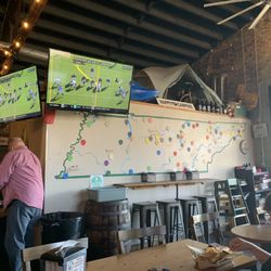 Happy Trails Brewing - TVs and a cool mural marking all the TN State Parks