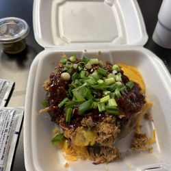Roy Boy’s Barbecue - Pulled pork loaded potato with sweet heat barbecue sauce!