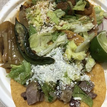 Cato's Tacos - Tostada (top: chicharrones aka. pork rinds, bottom: lengua aka. beef tongue) (rating: both 1/5) - Food Trucks Near Me - Sunnyvale, California