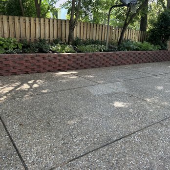 Lawn Sculptors - Pressure washed this retaining wall the small snoopy shed and driveway entire driveway. they were really covered in moss and tree sap. - Snow Removal Near Me - Saint Louis, Missouri Lawn Sculptors - Pressure washed this retaining wall the small snoopy shed and driveway entire driveway. they were really covered in moss and tree sap. - Snow Removal Near Me - Saint Louis, Missouri