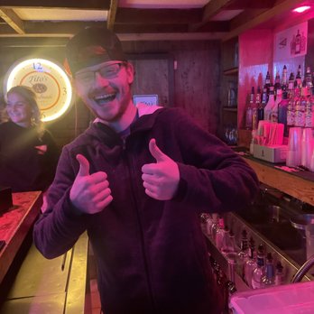 C I - a man giving a thumbs up in a bar - Nightlife Near Me - Athens, Ohio C I - a man giving a thumbs up in a bar - Nightlife Near Me - Athens, Ohio