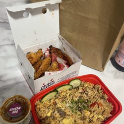 Fried Rice, plain wings, and Korean bbq, they have extra sauce on the side and slaw.