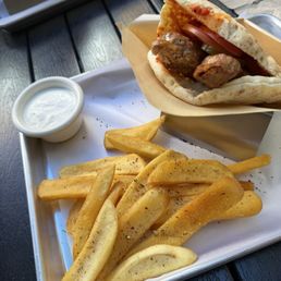 Lamb Kebab Pocket with Crispy Steak Fries and side of Garlic/yogurt sauce Lamb Kebab Pocket with Crispy Steak Fries and side of Garlic/yogurt sauce