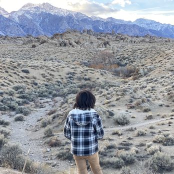 Mobius Arch Loop Trail - Checking out the rabbit he found running around - Hiking Near Me