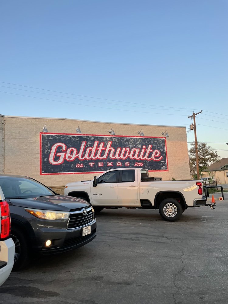 Exxon Quick Check And Cahoots Cafe Logo