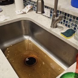 The main kitchen sink that didn't work our whole stay...