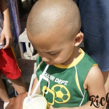 Playa de San Martin - His first taste of coconut milk from a real coconut. He's been hooked ever since. - Beaches Near Me - Cozumel, ROO Playa de San Martin - His first taste of coconut milk from a real coconut. He's been hooked ever since. - Beaches Near Me - Cozumel, ROO