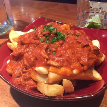 Beacon Pub & Eatery - Butter chicken Poutine (tandoori) that I highly recommend. - Pubs Near Me - Whistler, British Columbia Beacon Pub & Eatery - Butter chicken Poutine (tandoori) that I highly recommend. - Pubs Near Me - Whistler, British Columbia