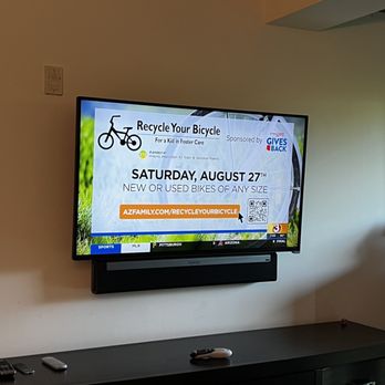 Connected Media Solutions - Bedroom 50" TV with Playbar, hidden power outlet and wiring. - Home Theatre Installation Near Me Connected Media Solutions - Bedroom 50" TV with Playbar, hidden power outlet and wiring. - Home Theatre Installation Near Me