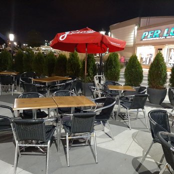 The Moose - Full patio cordoned off with nice greenery. - Pubs Near Me - Woodbridge, Ontario