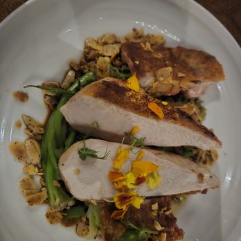 Millwright's - Chicken breast over a nest of broccolini - New American Near Me - Simsbury, Connecticut Millwright's - Chicken breast over a nest of broccolini - New American Near Me - Simsbury, Connecticut