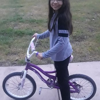 Concepcion Park - Supergirl riding her bike - Parks Near Me - San Antonio, Texas