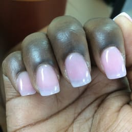 This is a fresh set of nails cuticles and shape look awful.  Pinkie is shorter than the rest. Awful job.