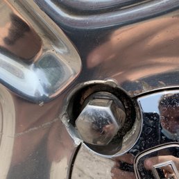 Scratched up and dented rim .