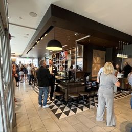View from main entrance, includes lobby, bar, and extended dining area.
