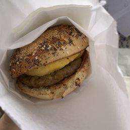 Sausage egg cheese everything bagel sandwich
