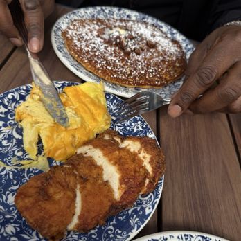 Tupelo Honey Southern Kitchen & Bar - Sweet Potato Pancake with chicken and scrambled eggs - Southern Near Me - Asheville, North Carolina Tupelo Honey Southern Kitchen & Bar - Sweet Potato Pancake with chicken and scrambled eggs - Southern Near Me - Asheville, North Carolina