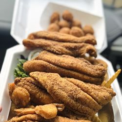 Q's Place Creole Cooking & Seafood - Fish, shrimp & hush puppies.