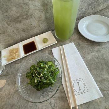 moment sushi - Seaweed salad that had some cucumbers in it. And a nice cold glass of iced green tea - Japanese Near Me - San Diego, California moment sushi - Seaweed salad that had some cucumbers in it. And a nice cold glass of iced green tea - Japanese Near Me - San Diego, California