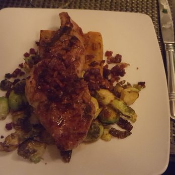 Cedric's Tavern - My mom got the pork chop with bacon bits. She said that is her favorite meal of all time. - Pubs Near Me - Asheville, North Carolina